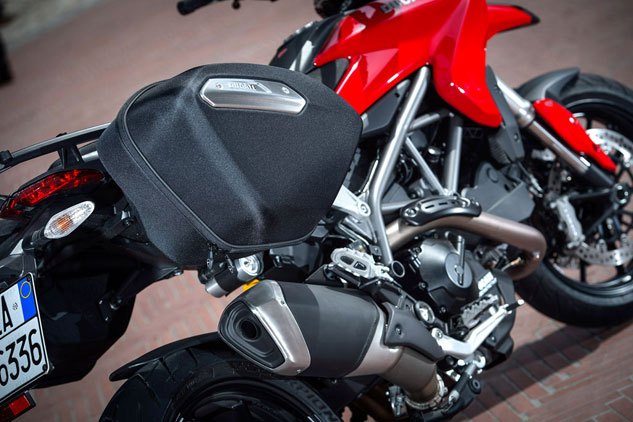 2013 ducati hyperstrada review, The semi rigid panniers do not have a locking mechanism to securely keep the bags closed leaving you to either carry them with you run a small padlock through the zipper pull tabs or gamble your gear will be there when you return