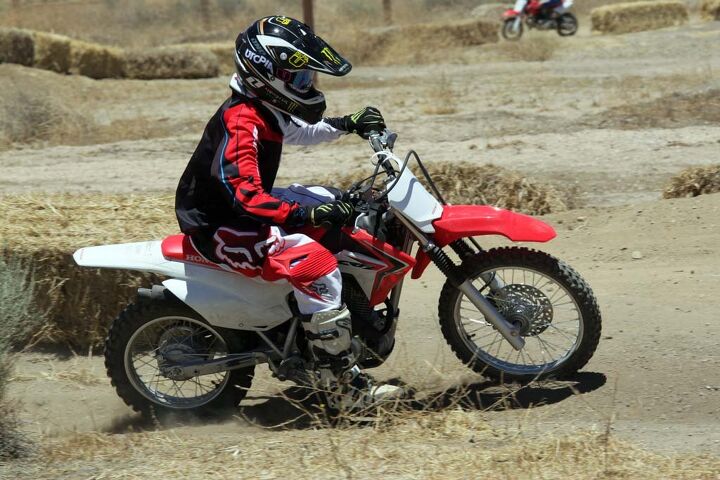 2014 honda crf125f and crf125f big wheel review, We brought in young gun Duran Morley to kick up some dust on the new CRF125F Judging by the smile on his face each time he came back it s safe to say he liked it He was especially impressed by the engine s wide powerband