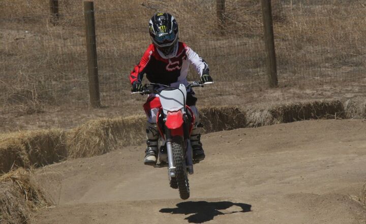2014 honda crf125f and crf125f big wheel review, Our 13 year old test rider preferred the stiffer suspension of the 125F over the 150F he also rode during the day Its maneuverability advantage over the 150F made the 125F his pick were he to take a bike home with him