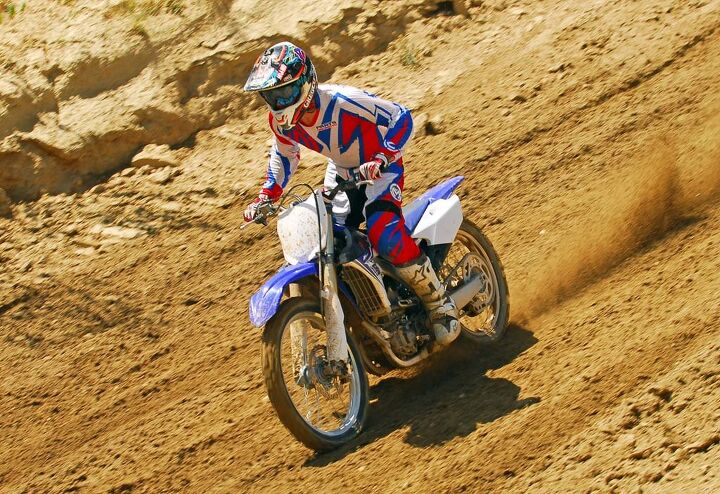 2014 yamaha yz250f first ride, Yamaha s KYB Speed Sensitive System fork and fully adjustable shock were right on the money for tester Ryan Abbatoye who praised its sensitivity over high speed hits such as whoops and stutter bumps as well as its bottoming resistance during G out landings like this one