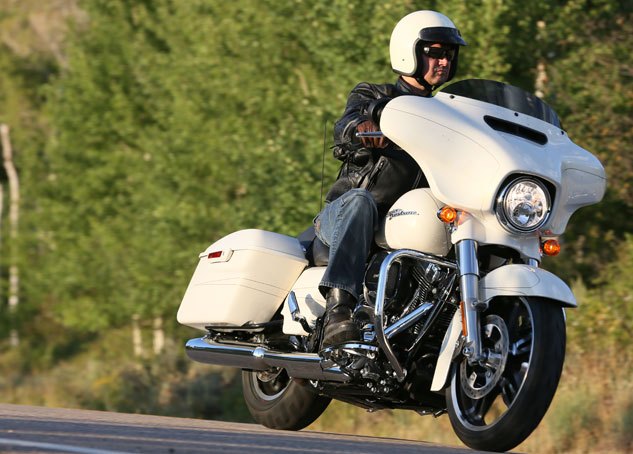2014 harley davidson touring motorcycles review, Because of slam dunks like the Boom Box system we re excited for what Project Rushmore can mean for Harley Davidson particularly as it relates to the Dyna and Softail lines in years to come