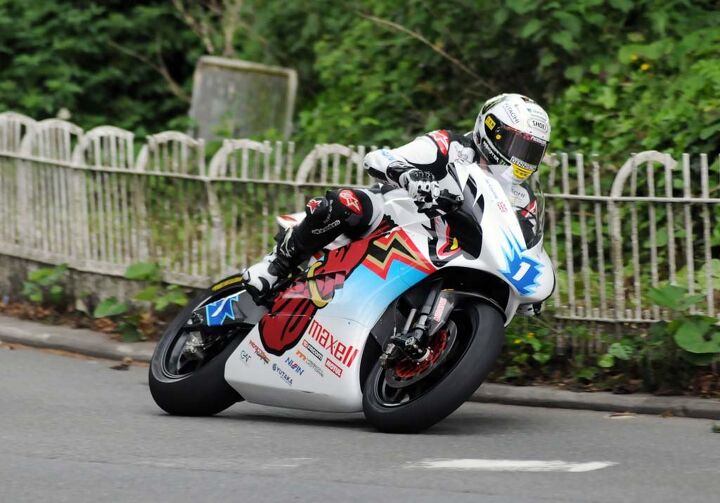 isle of man tt 2014 wrap up, An injured wrist hampered John McGuinness week but did not stop him from setting a new record in the TT Zero electric race averaging a speed of 117 366 mph