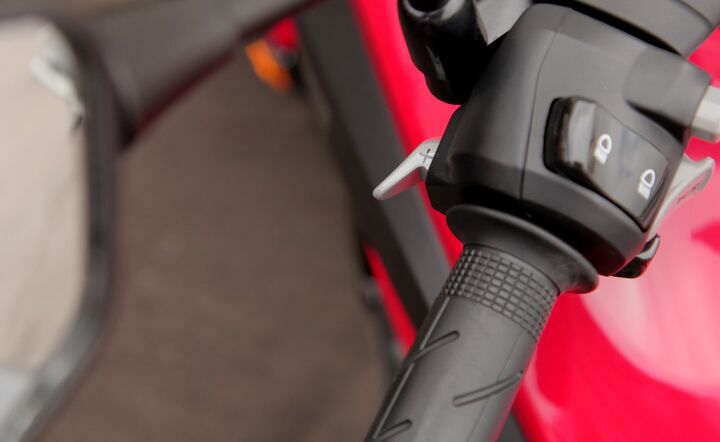 no shift shootout 2014 aprilia mana gt vs bmw c600 sport vs honda nc700 dct, The upshift button on the NC700X is on the front of the grip for use by the index finger our preferred arrangement
