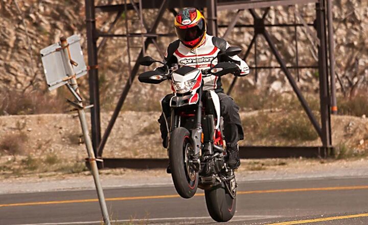 mega motard shootout 2014 ducati hypermotard sp vs mv agusta rivale video, The Hypermotard s 821cc V Twin is smooth predictable capable and fun It s also about 20 hp more and 10 ft lbs of torque less than the old air cooled 1100 Twin
