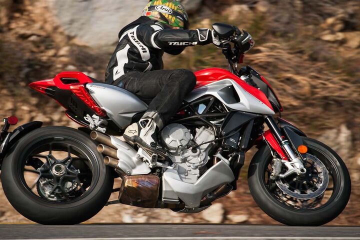 mega motard shootout 2014 ducati hypermotard sp vs mv agusta rivale video, The Rivale is proof of MV s quest to solve its fuel mapping issues The new arrangement of 1s and 0s in the bike s ECU controlling throttle fuel issues has transformed the 798cc Triple into one of the best power sources to ever propel a motorcycle