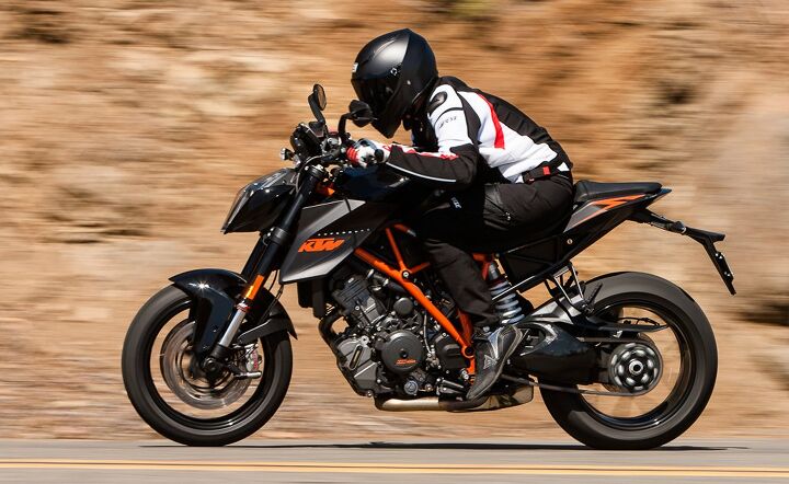 2014 ultimate streetfighter finale video, For a motorcycle that looks as aggressive as the Super Duke R its comfortable ergos are a pleasant surprise There s plenty of room to scoot fore and aft on the saddle and the footpeg placement offers generous legroom