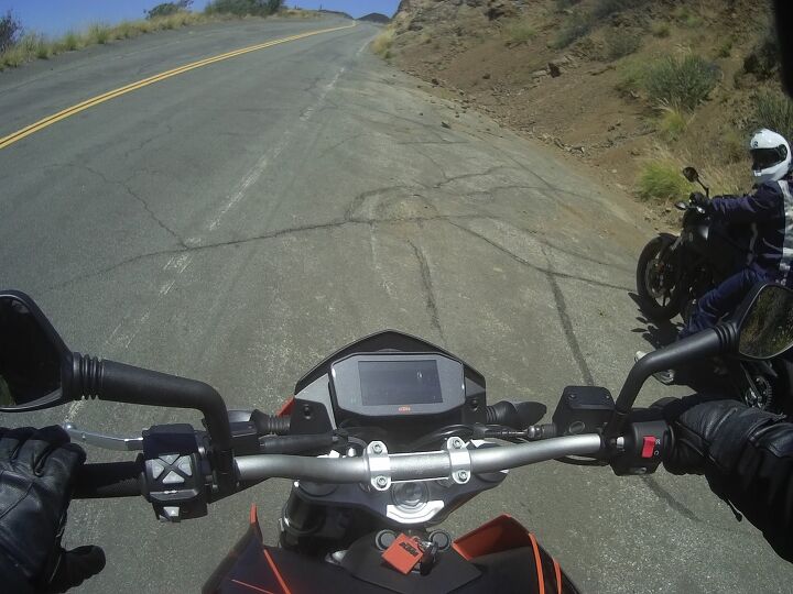 suzuki s sv650 takes on the competition, This screengrab from Sean s helmet cam shows how hard the KTM s TFT display is to see The display is pointed almost straight up and harsh sunlight blocks any view of the screen