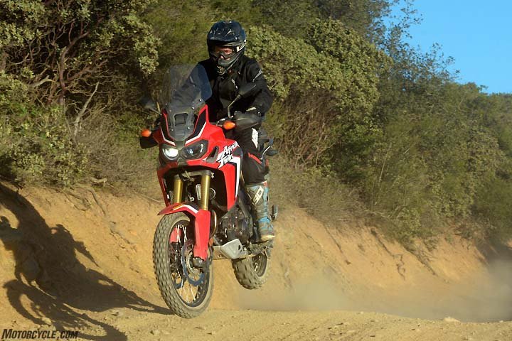 honda africa twin shootout dct vs manual transmission, The manual transmission model isn t necessarily sportier than the DCT but old school riders might appreciate it more Either version is more than competent at tackling trails fire roads and even semi gnarly technical sections of trail