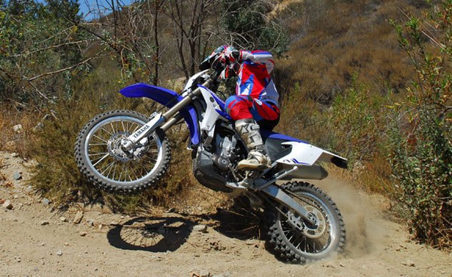 2013 yamaha wr450f review, The Yamaha WR450F offers plenty of snap for racing in a light feeling quick steering chassis with excellent suspension It s the consummate playbike and an excellent platform for off road racing