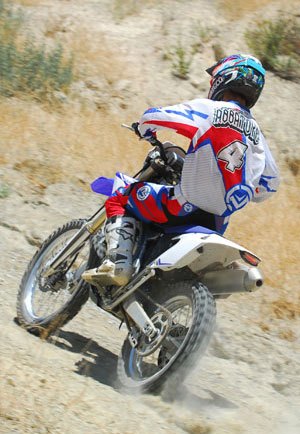 2013 yamaha wr450f review, While the WR450 s engine is strong it s hard to hide its motocross roots in loose dirt where traction is critical Extra attention must be paid with the clutch hand to minimize wheelspin