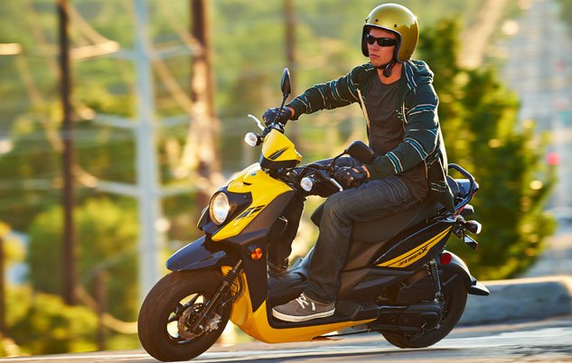 2014 yamaha lineup unveiled, The new Zuma 50FX is a slightly sportier take on the rugged Zuma 50F here in its Vivid Yellow Raven colors Also available in Team Yamaha Blue White