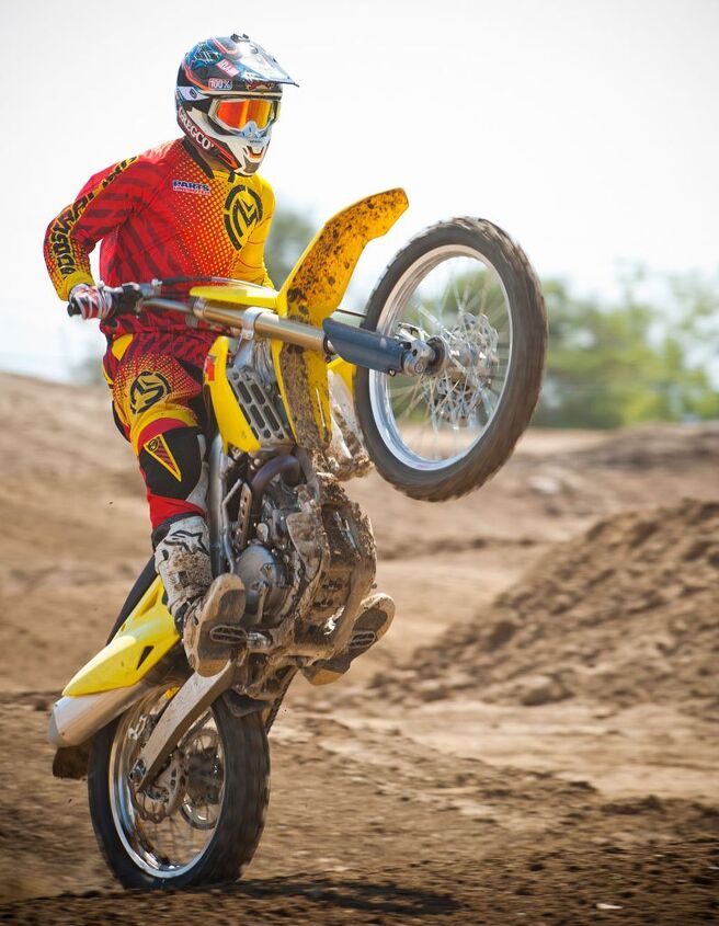 2014 suzuki rm z450 review first ride, People claim that past RM Z450 s had soft stock suspension but for a 170 pound guy like me the RM Z s suspension works great says Abbatoye