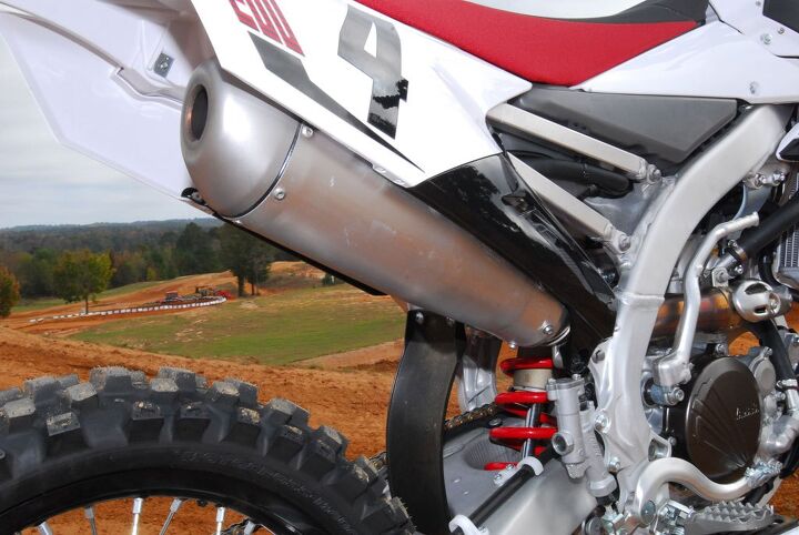 2014 yamaha yz250f review, More mass centralization effort is evident in the redesigned exhaust system which features a more compact muffler that is located lower and closer to the middle of the machine lowering the chassis center of gravity