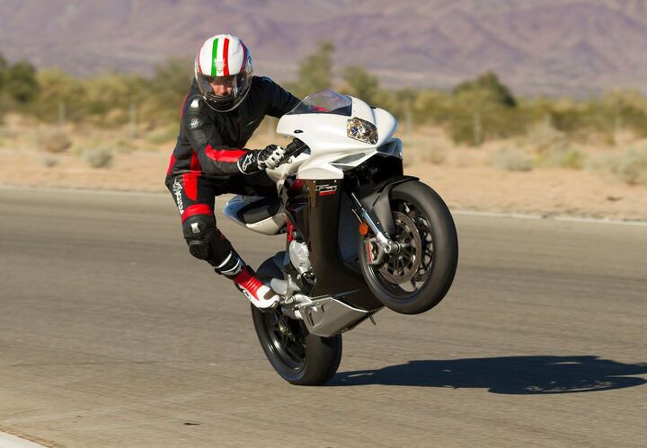 2014 mv agusta f3 800 review first ride, Gratuitous wheelie shot courtesy of MV Agusta s test rider Franco Zenatello Previous fuel map settings on other MVs were so inconsistent that seasoned wheelie veterans like E i C Kevin Duke were hesitant to hoist one as it was almost impossible to manage