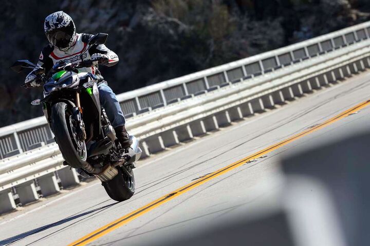 2014 kawasaki z1000 abs first ride, Power wheelies are made effortless by way of upgrades to low and mid range engine performance and shorter first through fifth gearing ratios