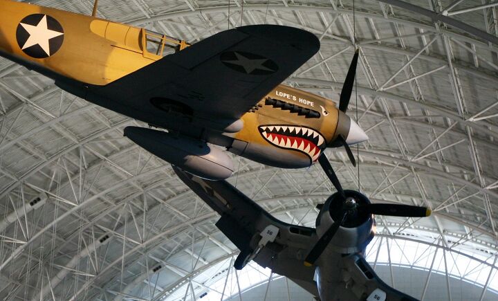 the wings tour 2014 leg one, Was this the face that launched a thousand motorcycle paint job and helmet designs The Curtiss P 40E in American Volunteer Group Flying Tigers colors