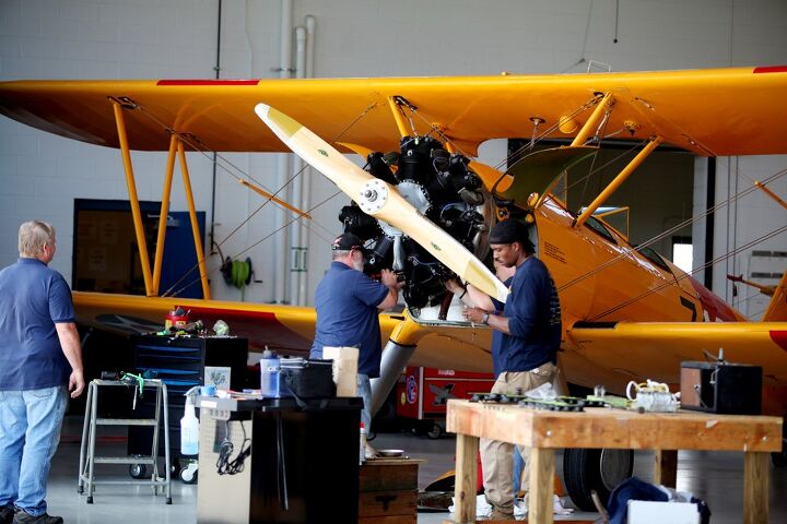 the wings tour 2014 leg two, The staff of the Military Aviation Museum includes mechanics who keep the collection like this Stearman N2S 3 in flying shape