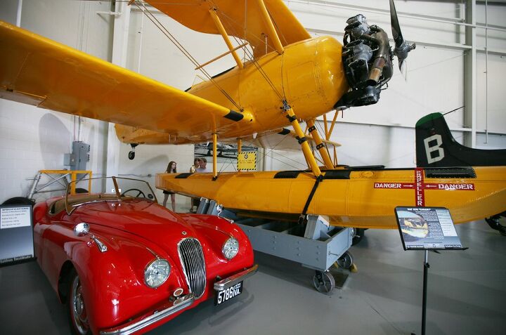 the wings tour 2014 leg two, A gearhead s paradise a 1950 Jaguar XK120 and a N3N 3 Canary seaplane on display at the Military Aviation Museum