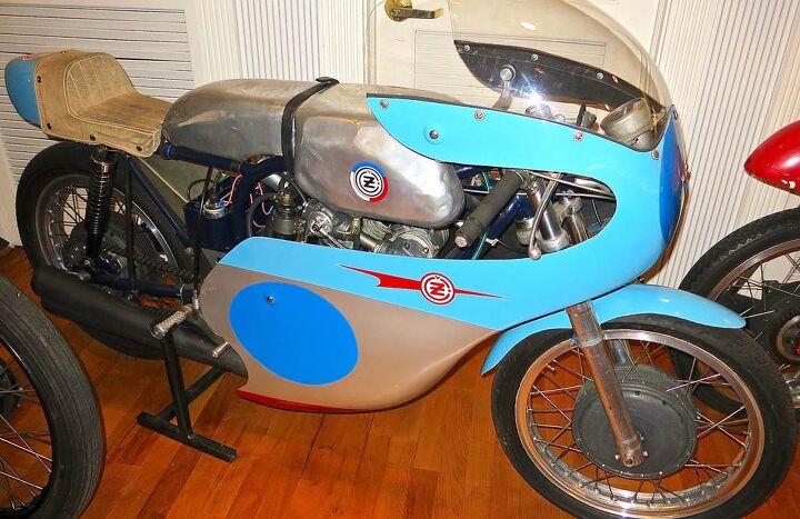 solvang vintage motorcycle museum, CZ built 125 and 250cc DOHC Twins in the 60s When the Czechs changed the rules to allow only 2 strokes in the 250 class CZ bumped the twin to 320 to run in the 350 class where it had to contend with the Jawa Twin and Honda Four