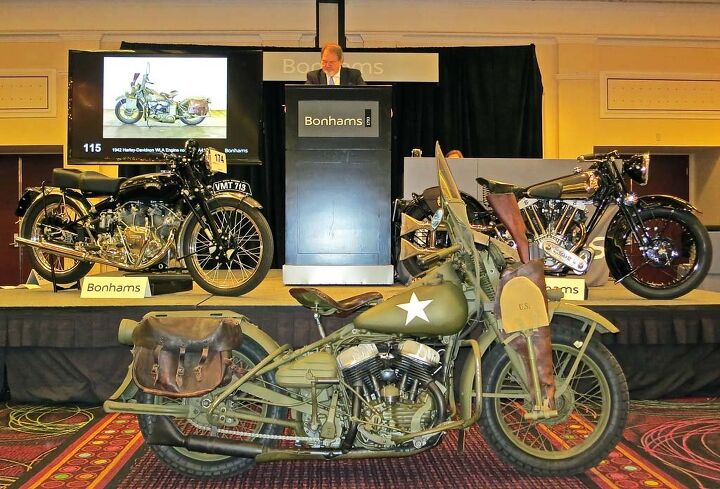 2015 bonhams motorcycle auction, The venerable Bonhams auction is conducted in traditional British style at a leisurely pace by American standards and held at Bally s Hotel and Casino on the strip The restored 1942 Harley Davidson WLA military model brought 24 725 The 1950 Vincent White Shadow on the left was a tad higher at 224 250