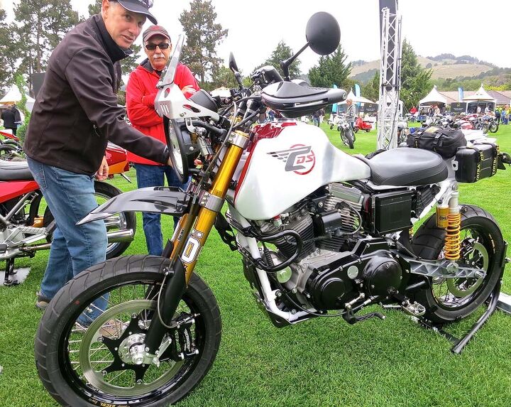 the quail motorcycle gathering 2015 report, Jim Carducci points out a detail on his Sportster based SC3 Adventure model