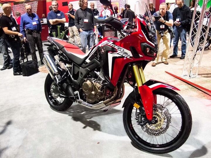 international motorcycle show long beach 2015, In Hondaville the big news is the Africa Twin sighted here for the first time in the wild She starts at a very reasonable by current standards 12 999 and 13 699 for the DCT version both come with ABS and HSTC traction control