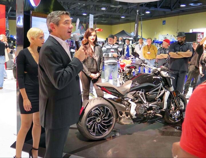 international motorcycle show long beach 2015, Ducati was the only big manufacturer to bring fashion models beer and snacks and are reporting sales through the roof Coincidence North American CEO Dominique Cheraki reveals the new XDiavel and its new variable valve timing engine my personal hit of the show