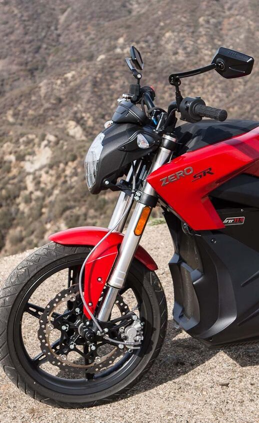 2014 zero sr review, The SR sports some serious hardware like a 43mm inverted fork Nissin calipers a wave type rotor and even a steel braided line The optional Power Tank rests where a traditional gas tank would reside While nice the excessively long brake line just looks unsightly