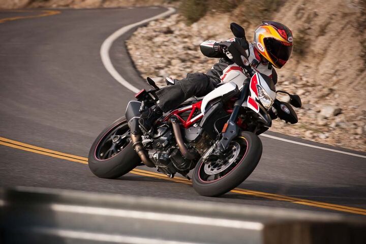 2014 ducati hypermotard sp review video, Forged Marchesini wheels help the Hyper SP change direction easily And though they don t look as stylish the traditional mirror stalks are much more functional than the fold out units on the old Hyper