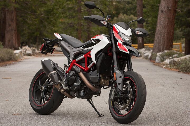 2014 ducati hypermotard sp review video, There s no mistaking this is anything other than a Ducati Hypermotard and though it s still wild and crazy we dare say the second gen Hyper is just a touch more civilized than its predecessor