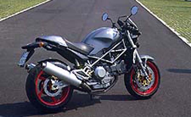 church of mo 2001 ducati monster s4 first ride, Carbon fiber and red rims are key visual clues when trying to spot an S4 in a crowd of Monsters