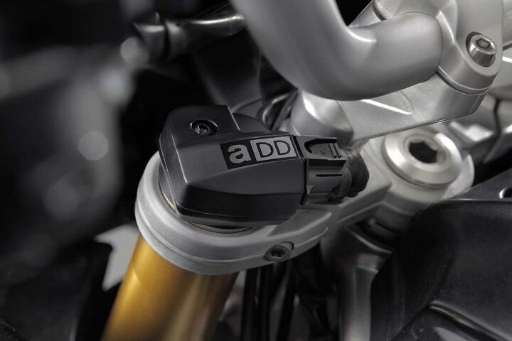 2015 aprilia caponord 1200 abs travel pack review video, Beneath that cap is Aprilia s patented air pressure sensor used to determine fork position It s part of the Aprilia Dynamic Damping system