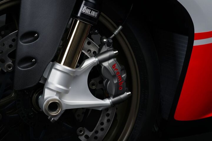 exploring lightweight materials on motorcycles, The Panigale s monobloc Brembo M50 calipers look impossibly small but deliver phenomenal power and feedback
