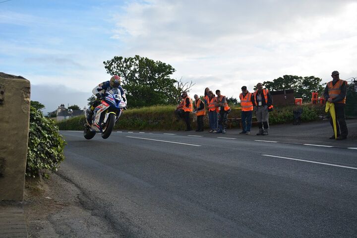 2017 isle of man tt wrap up report, Marshals on the job as bikes fly by Photo by Andrew Bell