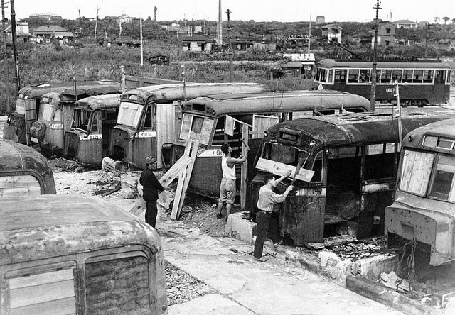 winning the peace, Homeless Japanese citizens hauled these bus carcasses into a makeshift community and converted them into family abodes during the severe housing shortages in the aftermath of the U S firebombing of the Japanese mainland near the end of WWII AP Photo Charles Gorry 1946