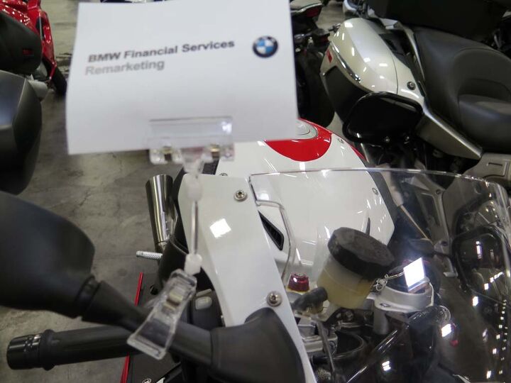 inside a motorcycle auction, Remarketing is the word of the day