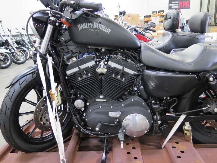 inside a motorcycle auction, Everything s sold as is Some will need a little elbow grease