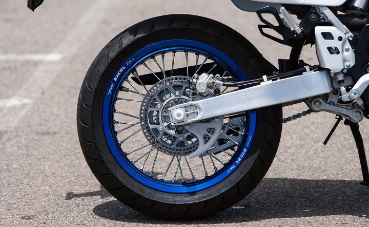 2014 suzuki dr z400sm track review, Blue anodized RK Excel spoked wheels look stunning in the sunlight and provide a classy touch to the DR Z Note the heavily drilled rear brake disc