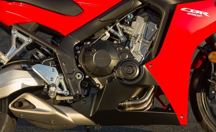 2014 honda cbr650f first ride review, The engine and exhaust placement emphasize Honda s mass centralization philosophy