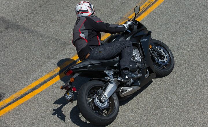2014 honda cbr650f first ride review, The CBR650F loves to be leaned over in corners all the way until its pegs drag