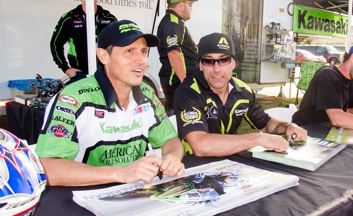 kawasaki ninja nights 2014, Racers Sahar Zvik and Jeremy Toye sign autographs for the fans