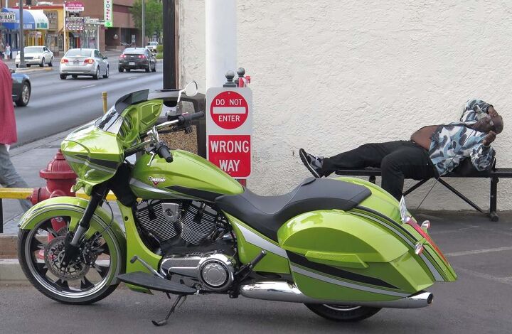 2015 victory magnum review, Some swooned at the bike in Plasma Lime Note the color matched saddlebag hinges and radiator cowling