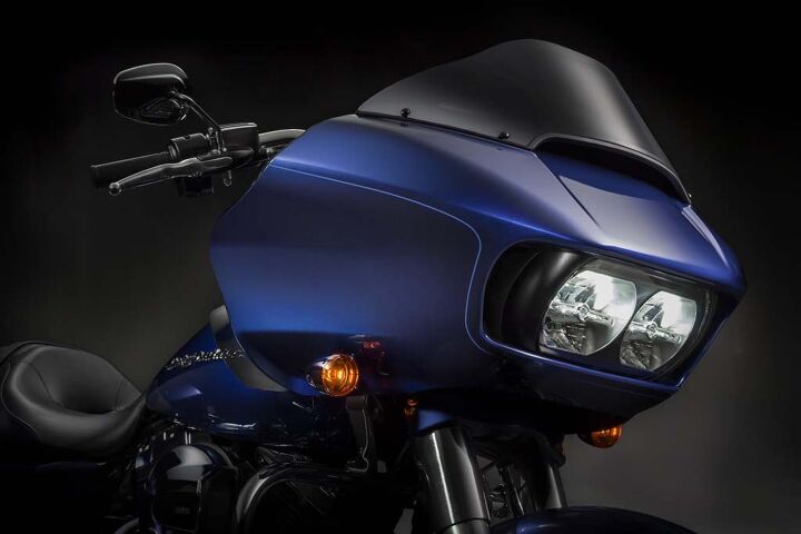 2015 harley davidson road glide preview, The new Road Glide retains the classic shark nose shape but its twin headlights are now LED units behind a single Plexiglas front cover with air intakes on either side
