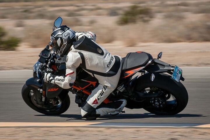 2014 super streetfighter smackdown video, That poor back tire is wholly incapable of coping with the KTM s uh huevos grande Of course that just makes it even more fun to ride when you re just playing around on track think motocross bike on a beautifully groomed golf course