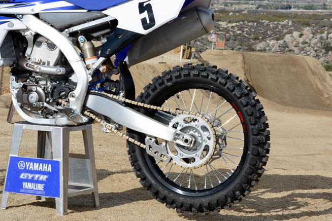 2015 yamaha yz450f review, Some of the detail changes to the 2015 YZ450F include Dunlop MX52 tires black anodized Excel Rims a 48 tooth sprocket instead of a 49T and a gold anodized D I D chain with a corrosion resistant coating