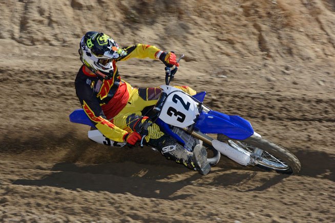 2015 yamaha yz125 yz250 first ride reviews, The YZ125 may lack displacement but it can shred a corner with the best of them Reigning WORCS Champion Robby Bell said that he was surprised how the 125 s stout mid range and shrieking top end allowed him to carry third gear through some of Glen Helen Raceway s rutted corners
