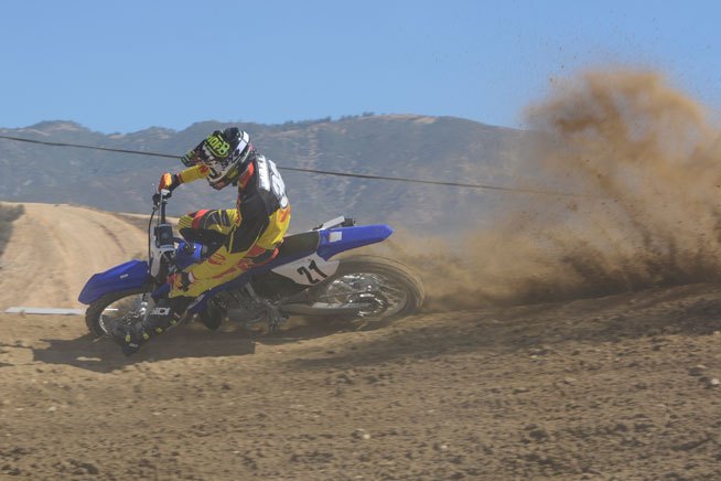 2015 yamaha yz125 yz250 first ride reviews, The YZ250 can still shred berms with the best four strokes on the market The key to happiness says Robby Bell lies in getting the most out of its ample mid range power Don t shift it too early and don t overrev it