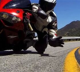 Weekend Awesome - Rider Picks Up GoPro Camera Mid-Corner