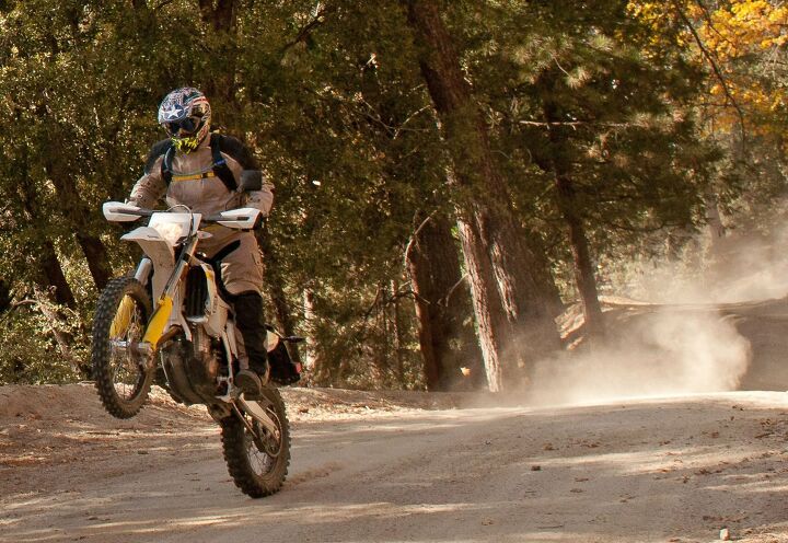 2015 husqvarna fe 350 s and fe 501 s review, While the FE 350 S prefers to be revved for maximum effect on the trail its DOHC Single still offers plenty of snap A simple flick of the clutch lever is all it takes to get the 350 to stand at attention