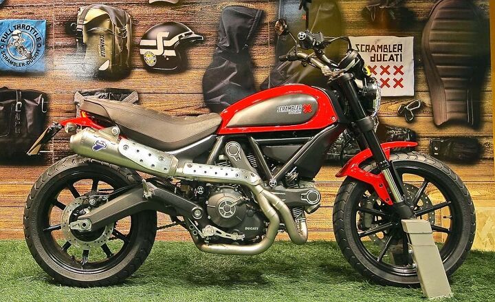 ducati scrambler retrospective, A Termignoni high pipe is on the way and carbon fiber heat shields are sure to follow Now if they could just get that rear header pipe out of harm s way